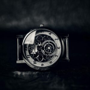 Close-up of a vintage mechanical wristwatch showcasing intricate gears and design.